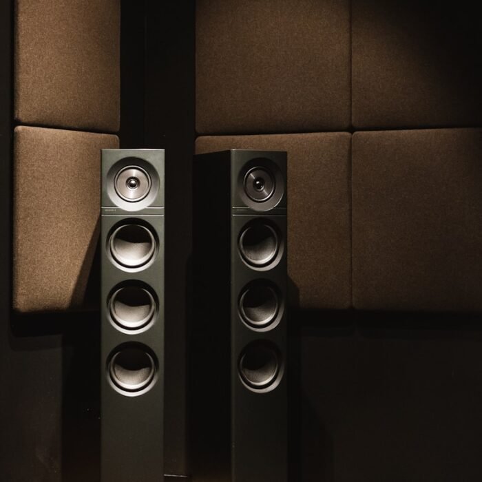 black and brown speaker on black surface