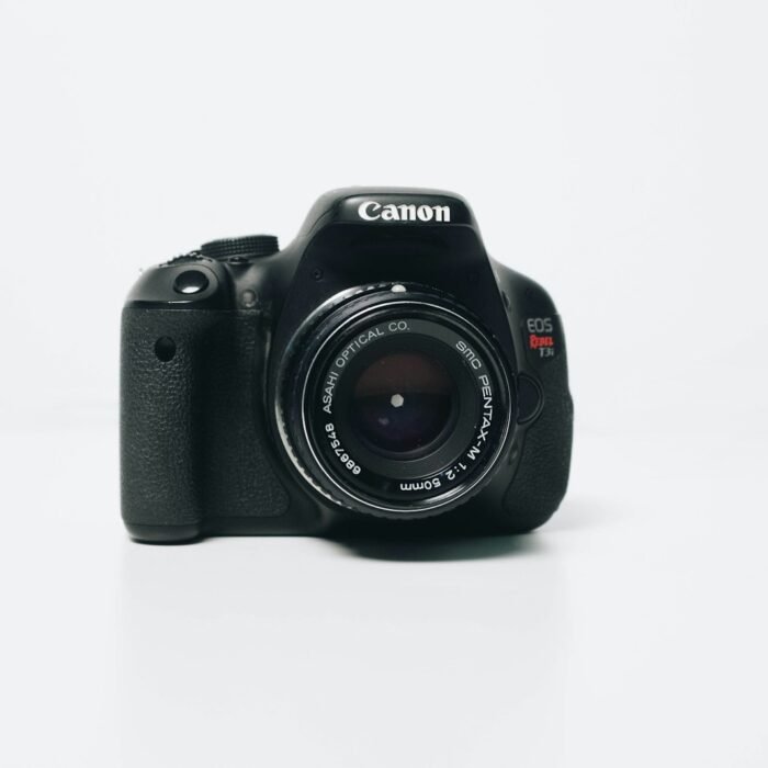 black Canon EOS Rebel-series DSLR camera